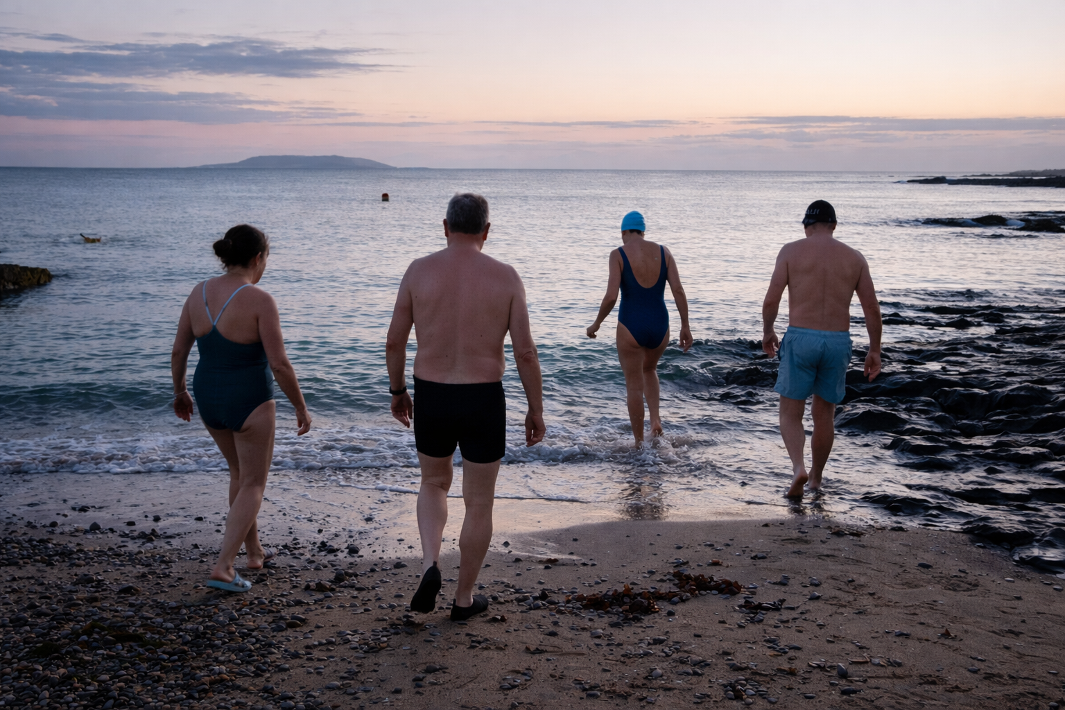 Sea swimming tips image showing a welcoming cold-water swim scene